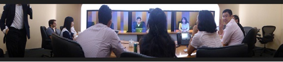 The picture above shows some of the participants trying out Cisco’s TelePresence.